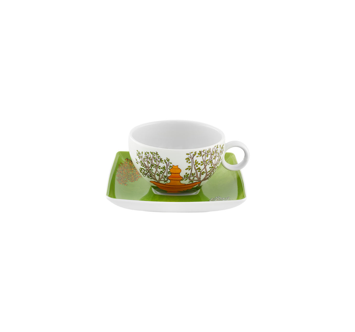 Jogo de chá com padrão floral e chávena com pires.